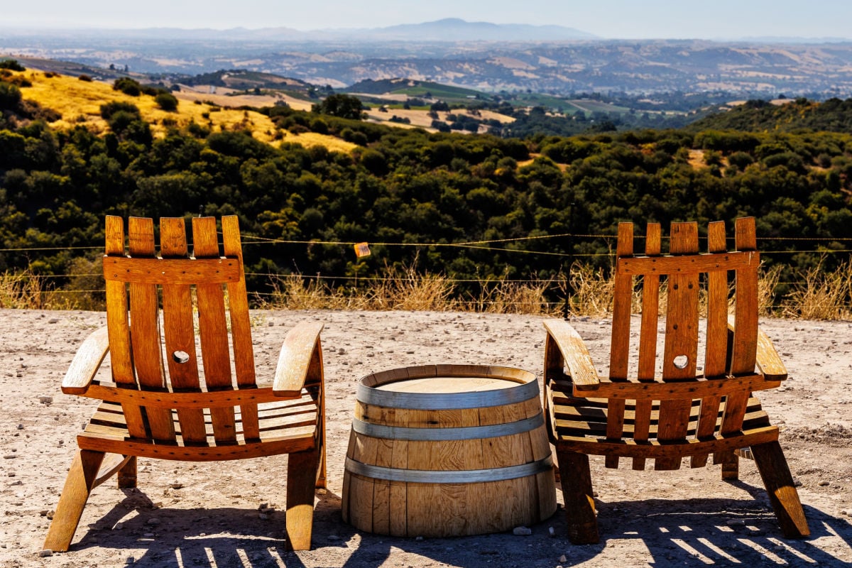 Two chairs at winery overlooking Paso Robles greenery